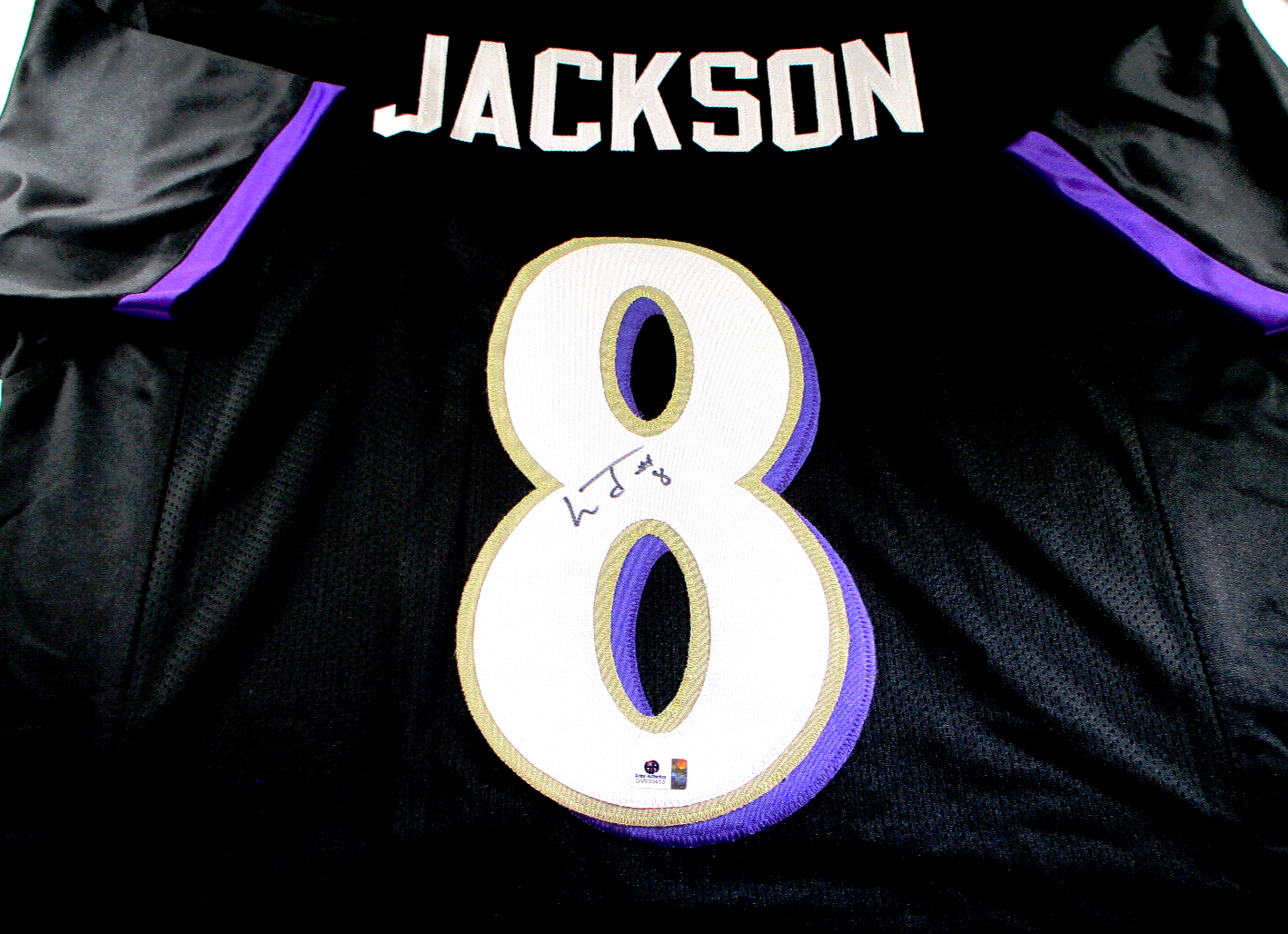 Lamar Jackson / Autographed Baltimore Ravens Custom Football Jersey / C.O.A.